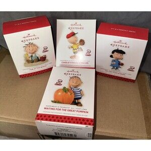 Lot of 4 Hallmark Keepsake Ornaments PEANUTS 12 Months of Fun Set w/boxes